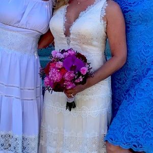 Catherine Deane cream lace and satin wedding dress.